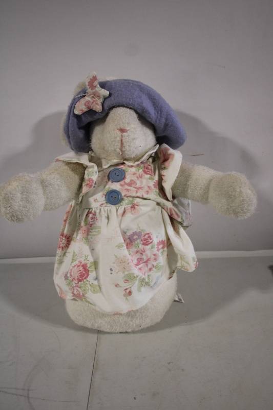 lot 99 image: Floral Dressed Plush Bunny with Lavender Hat