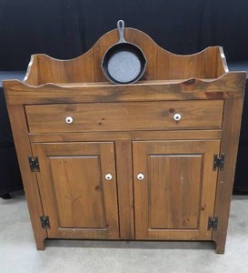 lot 32 image: #5 CAST IRON PAN  SMALL WOOD CABINET