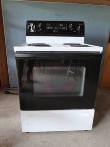 lot 15A image: WHIRLPOOL ELECTRIC STOVE.