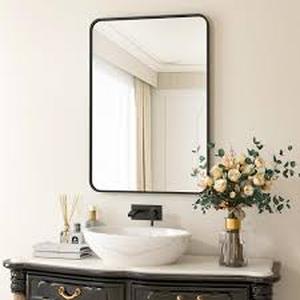 lot 13 image: XRAMFY 24 in. W x 36 in. H Rectangular Aluminum Alloy Framed Rounded Black Wall Mirror   Customer Returns See Pictures