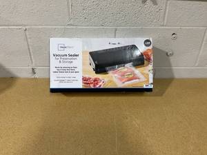 lot 298 image: Mainstays Vacuum Sealer with Built-in Cutter and Roll Storage