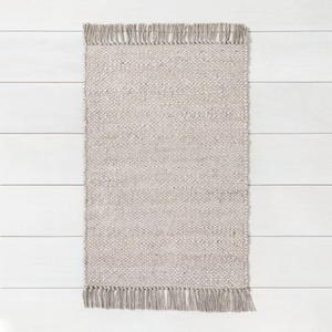 lot 475 image: Bleached Jute Fringe Rug - Hearth & Hand with Magnolia