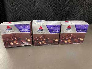 lot 61 image: Set of 3 Boxes Atkins Indulge Chocolate Covered Almonds