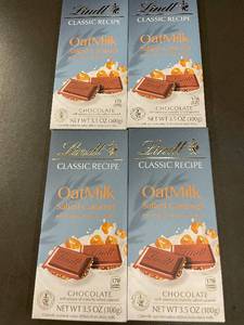 lot 69 image: Set of 4 Lindt OatMilk Salted Caramel Chocolate Bars