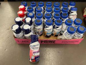 lot 89 image: Assorted Nutrition Shakes Including Ensure and Boost