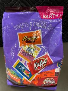 lot 161 image: Party Size Snack Assortment of Reeses, Jolly Rancher, and Kit Kat