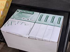lot 172 image: Lot of (9 Reams  4500 sheets) 2-hole Punch Top Sheets  20#  White  92 Bright  Grain Long 8-12x11 - Perfect Cut Sheets