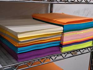 lot 217 image: Lot of (2 Stacks) Assorted Color Paper Stock 24# - White, Yellow, Orange, Blue, Purple, Green, Pink, Deep Blue, Bright Green and more 8-12x11