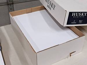 lot 212 image: Lot of (800 sheets) Domtar Husky Text Sheets  6024#  Smooth  White  Grain Long 12x18