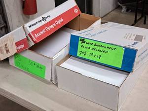 lot 214 image: Lot of (2 Boxes) Paper Stock - 60# PS White and 70# White Environment PC100 Recycled 12x18