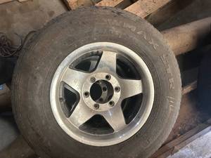 lot 25 image: 2 MATCHING RIMS AND TIRES