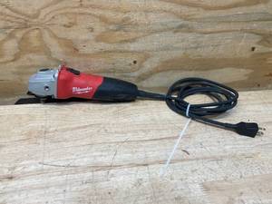 lot 49 image: MILWAUKEE 7 Amp Corded 4-12 in. Small Angle Grinder