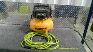 lot 7 image: Bostich Pancake Compressor Model with 40 of hose