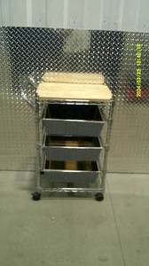 lot 19 image: Metro Style Utility Cart with Basket Drawers and Wood Cutting Board