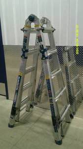 lot 94 image: Werner Multi Position Aluminum Ladder 1322