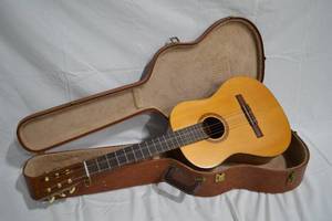 lot 4 image: Vintage Norman Acoustic Guitar