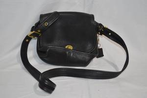 lot 45 image: Vintage Black Leather Coach Handbag