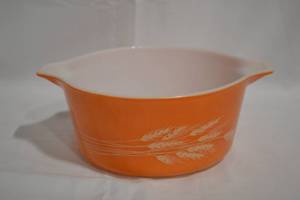 lot 50 image: Orange autumn harvest wheat pattern Pyrex baking dish.