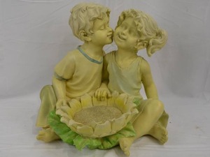 lot 144 image: Boy Kissing Girl Garden Statue