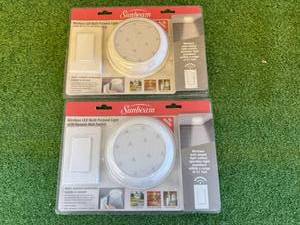 lot 299 image: 2 New Sunbeam Wireless LED Lights with Remote Wall Switch