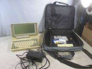 lot 17 image: (A-1) Vintage Toshiba T1200 Laptop ...