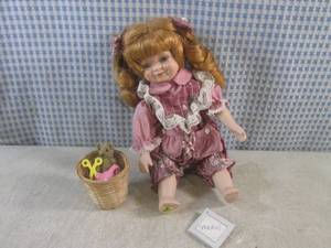 lot 39 image: (EC1) Sitting Porcelain Musical Dol...