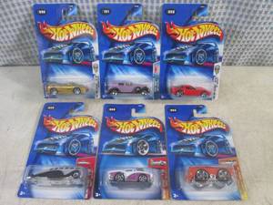 lot 134 image: (EC1) Assorted Hot Wheels in Packag...