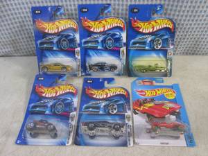 lot 136 image: (EC1) Assorted Hot Wheels in Packag...