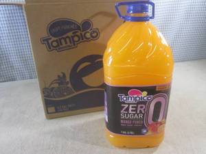 lot 142 image: (C-2) 4 - 1 Gallon Bottles Mango Pu...
