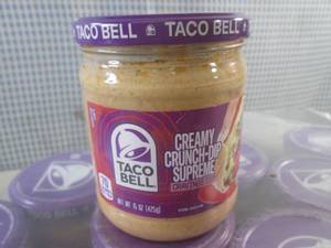 lot 159 image: (C-2) 12 Jars of Taco Bell Creamy C...