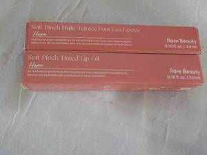 lot 91 image: 2 Soft Pinch Tinted Lip Oil from Ra...