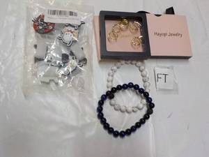lot 134 image: Jewelry and Water Bottle Tops...