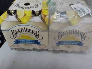 lot 140 image: 2 Bundaberg 4 packs Australian Lemo...