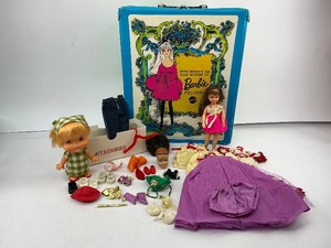lot 23 image: 1968 The World of Barbie Doll Case with Contents