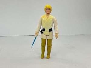 lot 63 image: 1977 Star Wars Luke Skywalker Action Figure with Weapon