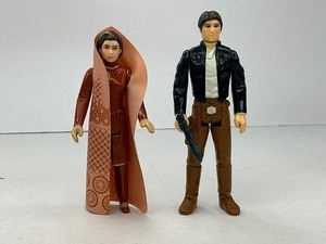 lot 82 image: 1980 Star Wars Princess Leia Organa & Han Solo in Bespin Outfit Action Figures