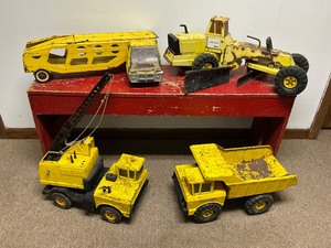 lot 149 image: Four Rusty Steel Tonka Toys