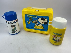 lot 195 image: Peanuts Charlie Brown Joe Cool Vintage Plastic Lunch Box with Thermos Plus G.I. Joe Thermos
