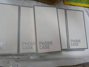 lot 63 image: 9 iPhone Phone Cases...