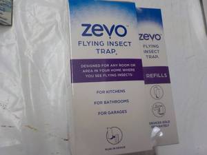 lot 107 image: Zevo Flying Insect Trap and 2 Refil...