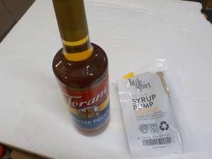 lot 126 image: Torani 25.4 Butter Pecan Syrup with...