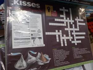 lot 177 image: 8 Hersheys Kisses Puzzles and Holi...