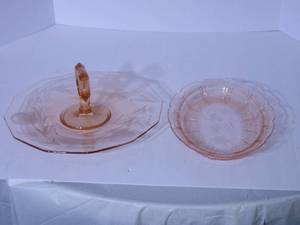 lot 123 image: Pink Depression glassware...