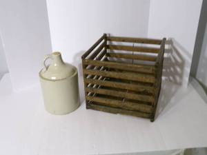 lot 63 image: Antique wooden crate with crock jug...