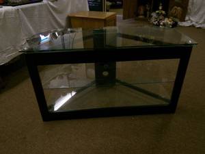 lot 72 image: Glass and Black Metal TV Stand 22x4...
