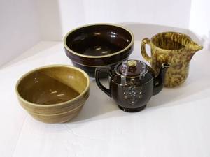 lot 18 image: Vintage USA  Primative croc bowls, ...