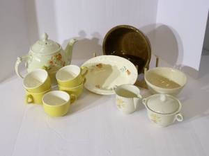 lot 23 image: Primitive croc bowl , USA teapot, s...