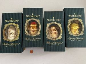 lot 19 image: Set of 4 Waterford Holiday Heirlooms Santa Ornaments