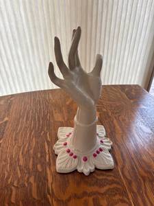 lot 74 image: Decorative Hand Jewelry Holder with Floral Base