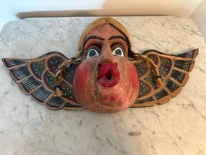 lot 108 image: Vintage Handcrafted Wooden Tribal Mask with Winged Design